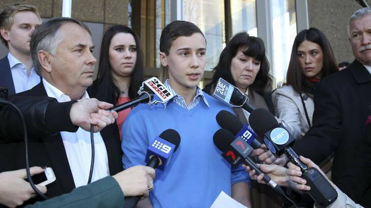 Tribute: Stuart Kelly, 16, the brother of Thomas Kelly, addresses the media at the supreme court on Friday. Photo: Brendan Esposito