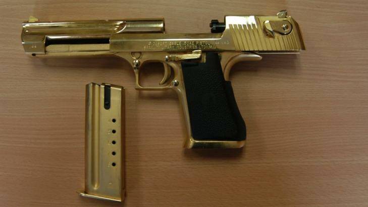 A gold-plated .357 calibre pistol, seized by police, which led to the name "Golden Gun" syndicate. Photo: Supplied
