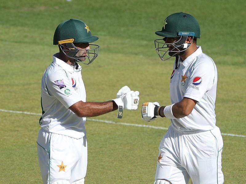 Pakistan's Babar Azam (R) and Asad Shafiq (L) have hit half-centuries in the match with Australia A.