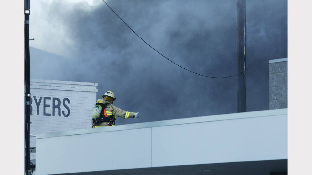 Scenes from the fire at Hunter Valley White Goods, Maitland Rd Mayfield. Picture Jonathan Carroll