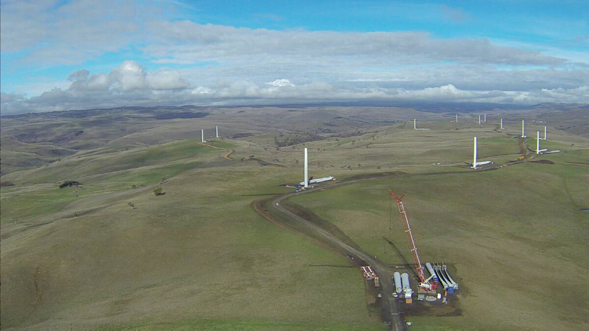 UP SHE GOES: Construction at the Boco Rock Wind Farm site is forging ahead, with the first of the 67 turbines expected to be fully installed this week. 