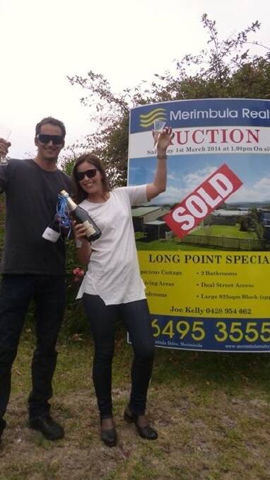 MERIMBULA: Sold $1.44 million under the hammer at Merimbula real estate auctions and celebrating their successful bid on a Hill Street property was Merimbula couple Mark and Lauren Bates.