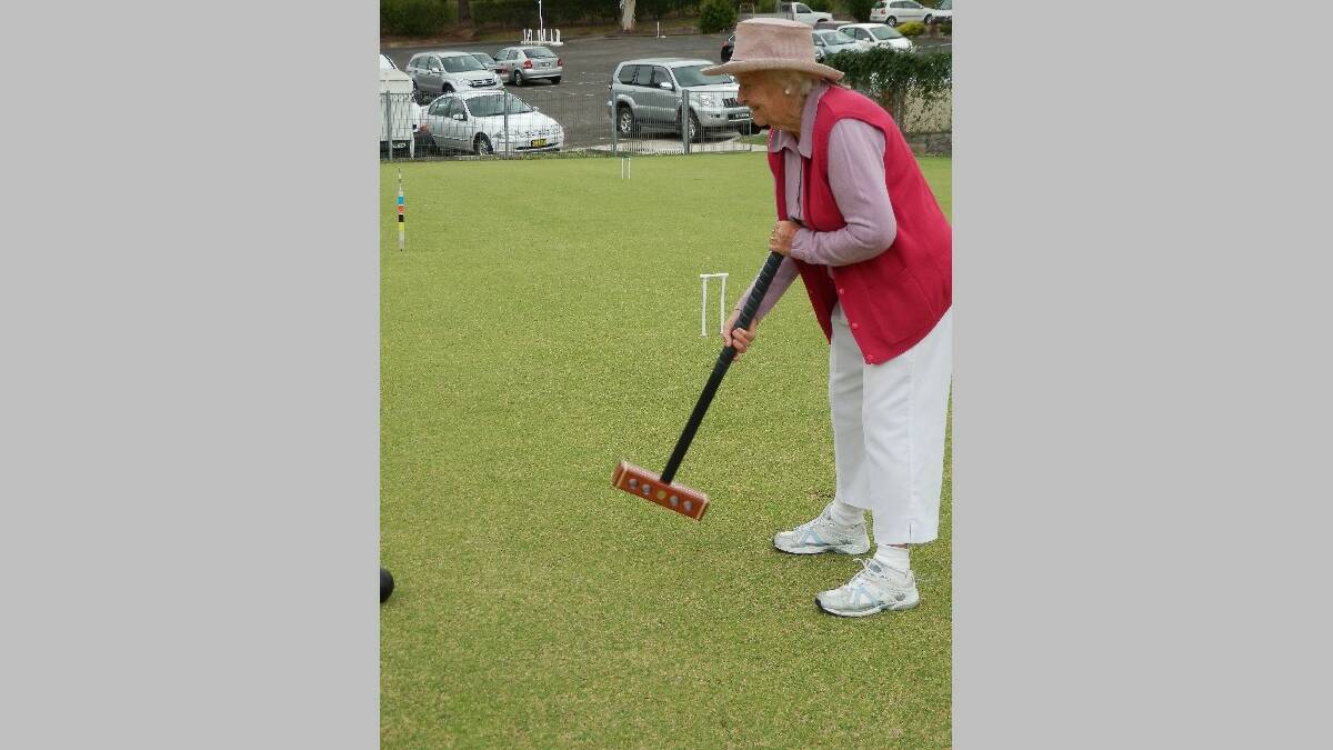 NAROOMA: Keen-to-win Edna Falkiner striking well at Golf Croquet on Sunday at the Narooma Sporting and Services Club. 