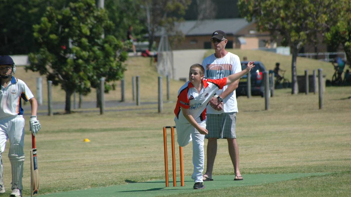 BATEMANS BAY: Tigers under 14s spinner Dylan Art rips one down the pitch against Ulladulla at Hanging Rock on Saturday. 