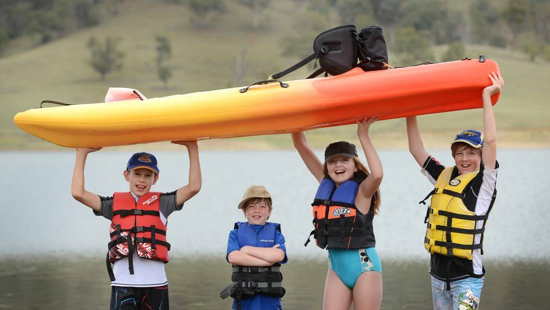 Among the campers enjoying Chaffey Dam this week have been Cooper, 11, and Jonny Edwards, eight, from Brisbane, Layne MacPherson, 10, from Nemingha and Ben Edwards, 12, from Brisbane, who were visiting their Tamworth grandparents. Picture: Barry Smith