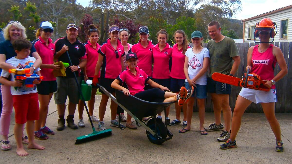 COOMA: The Cooma Fillies Ladies league-tag side has swapped football for rakes, shovels and wheelbarrows in the name of charity. They took part in a working bee in support of the Community Chest which helps local people experiencing financial hardship due to health issues. 