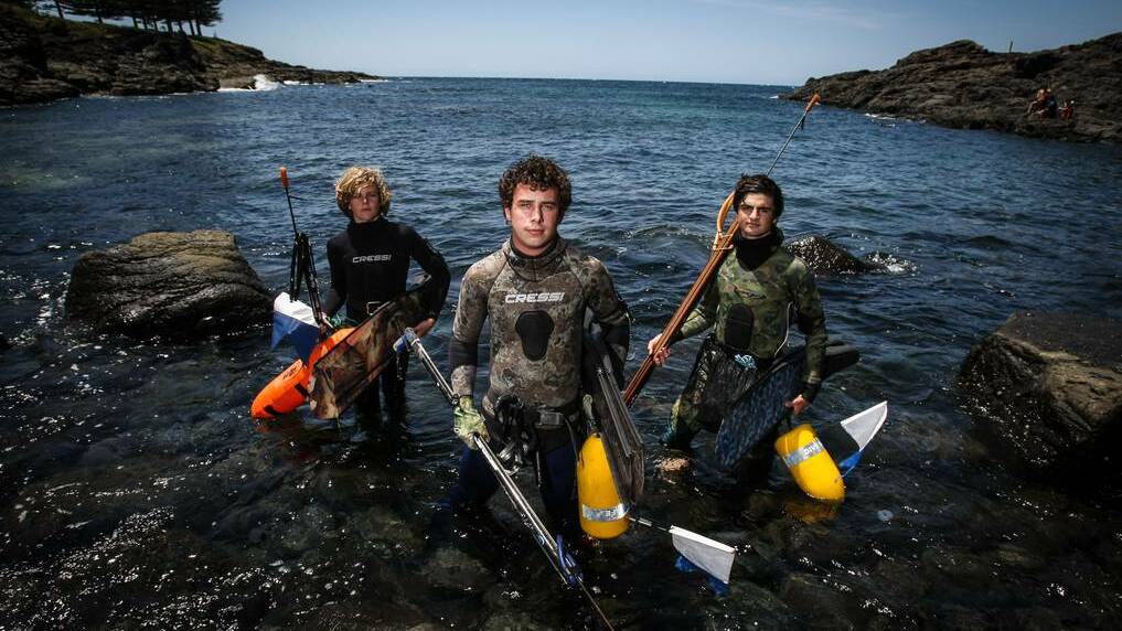South Coast Sea Snipers members Mitchell Bourke, president Max Gordon-Hall and Jack Loveday have urged spear fishers and skippers to be safe this summer. Picture: Dylan Robinson 