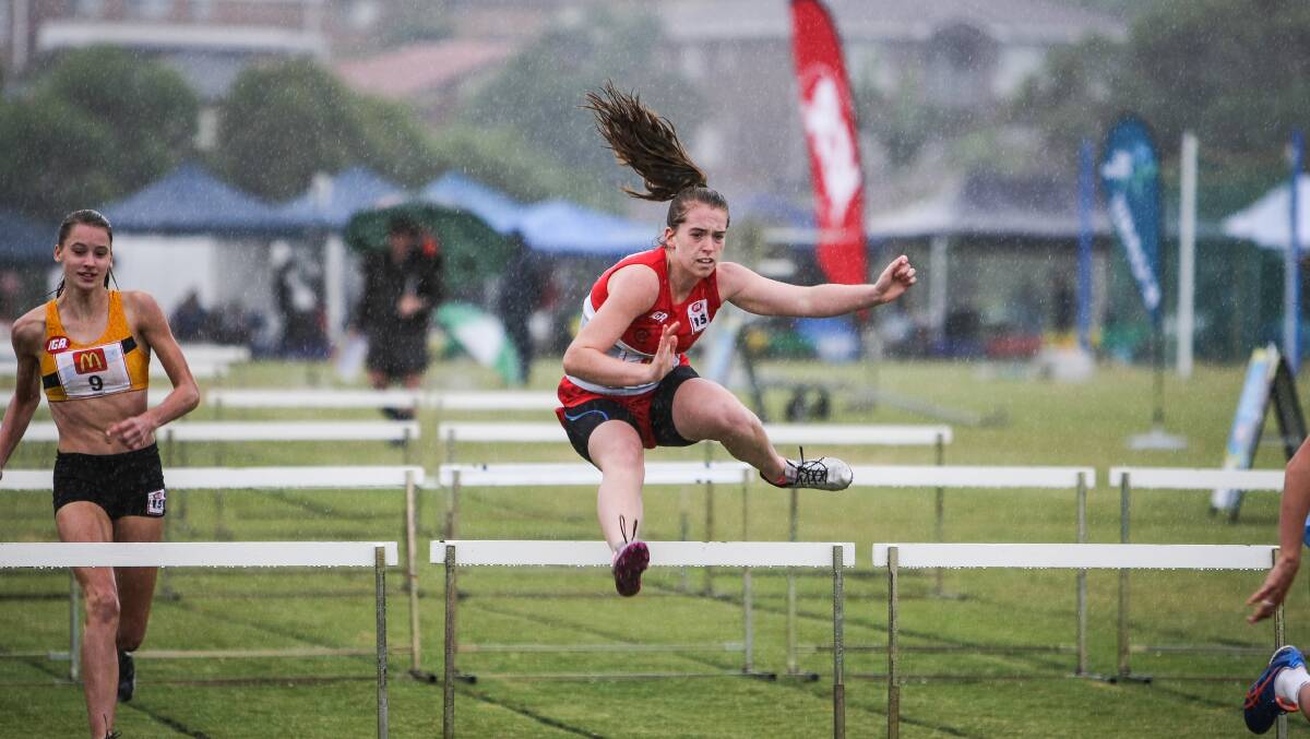 KIAMA: Kate Spender from Cherrybrook during girls hurdles at the State Little As Multi on Saturday. Picture: DYLAN ROBINSON 