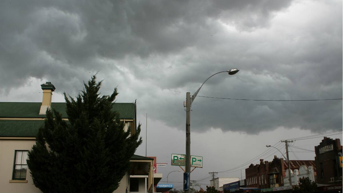  BEGA: Ominous clouds gather over Bega’s main shopping district ahead of a wild, but brief thunderstorm. Temperatures dropped sharply, winds picked up and over 9mm of rain fell within 15 minutes. 