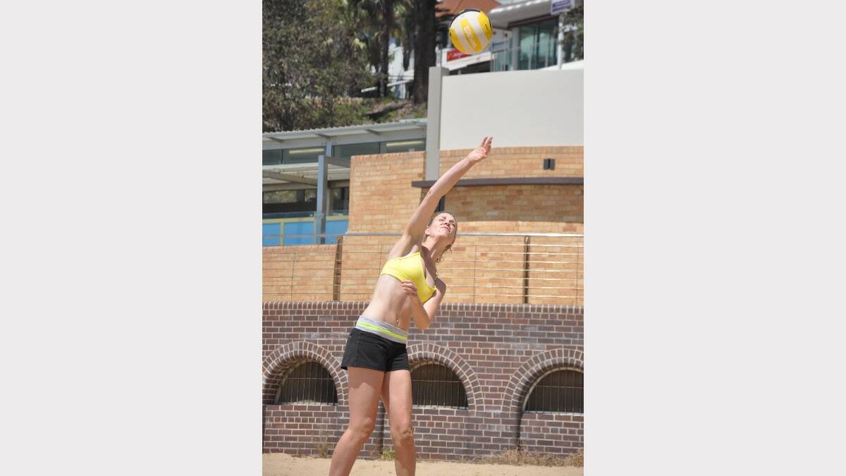 WOLLONGONG:  Shoalhaven's Lacey Bruce delivers a sizzling serve at the Shoalhaven Beach Volleyball Competition at North Beach, Wollongong, on Sunday. Photo: GILLIAN LETT  