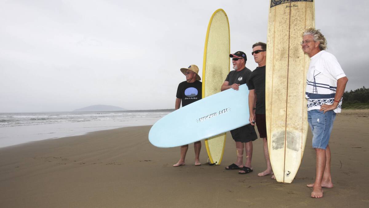 KIAMA: Bryan Malone from Lighthouse Church, Max Boyes from Kiama Anglican Church and surfers Jim Cahill and Allan Barraclough check out the surfing conditions before the 100 Beaches Challenge on Wednesday. Picture: DANIELLE CETINSKI  