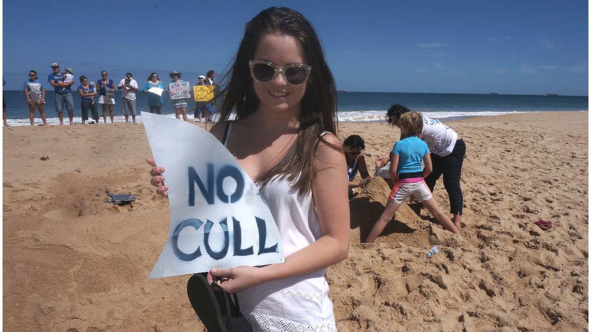 Kelly Underdown joined more than 200 others in protesting the Barnett government’s plan to bait and cull sharks at on Bunbury’s Back Beach on Saturday. 