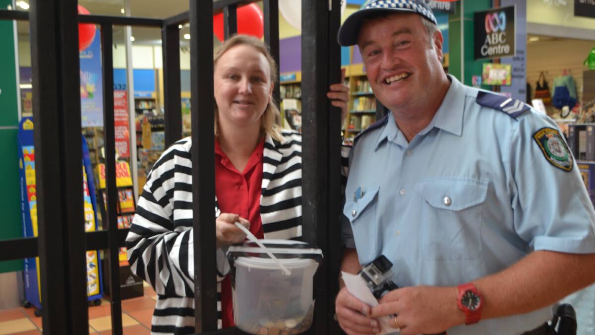 BATEMANS BAY: Eurobodalla identities were imprisoned on Thursday, all for a good cause. Target store manager Donna Kidston was locked up at the Village Centre, Batemans Bay, by Eurobodalla PCYC youth case manager Greg Curry for the inaugural Time 4 Kids fundraiser. Ms Kidston had to raise $500 for the PCYC before she could make bail. 