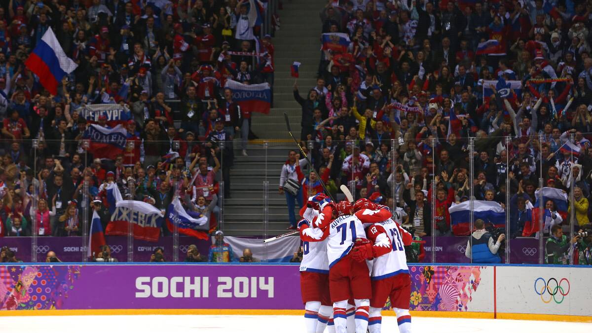 Russian players celebrate after scoring a disallowed goal against the United States during the Men's Ice Hockey Preliminary Round Group A game on day eight of the Sochi 2014 Winter Olympics. Photo by Streeter Lecka/Getty Images