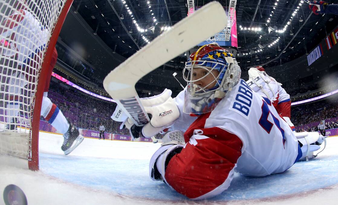 Cam Fowler #3 of the United States (not seen) scores a goal against Sergei Bobrovski #72 of Russia during the Men's Ice Hockey Preliminary Round Group A game on day eight of the Sochi 2014 Winter Olympics. Photo by Bruce Bennett/Getty Images