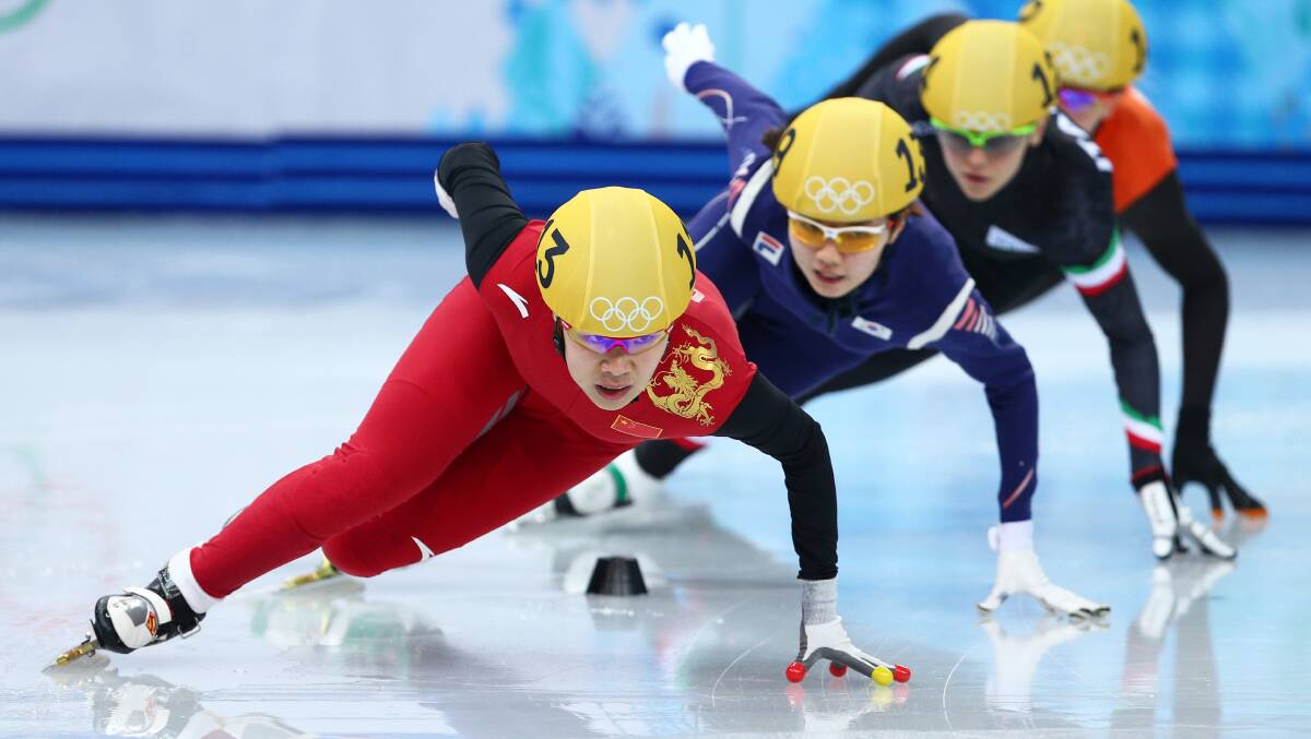  Yang Zhou of China leads the pack on the way to winning the gold medal during the Ladies' 1500 m Final Short Track Speed Skating on day 8 of the Sochi 2014 Winter Olympics at the Iceberg Skating Palace. Photo by Paul Gilham/Getty Images