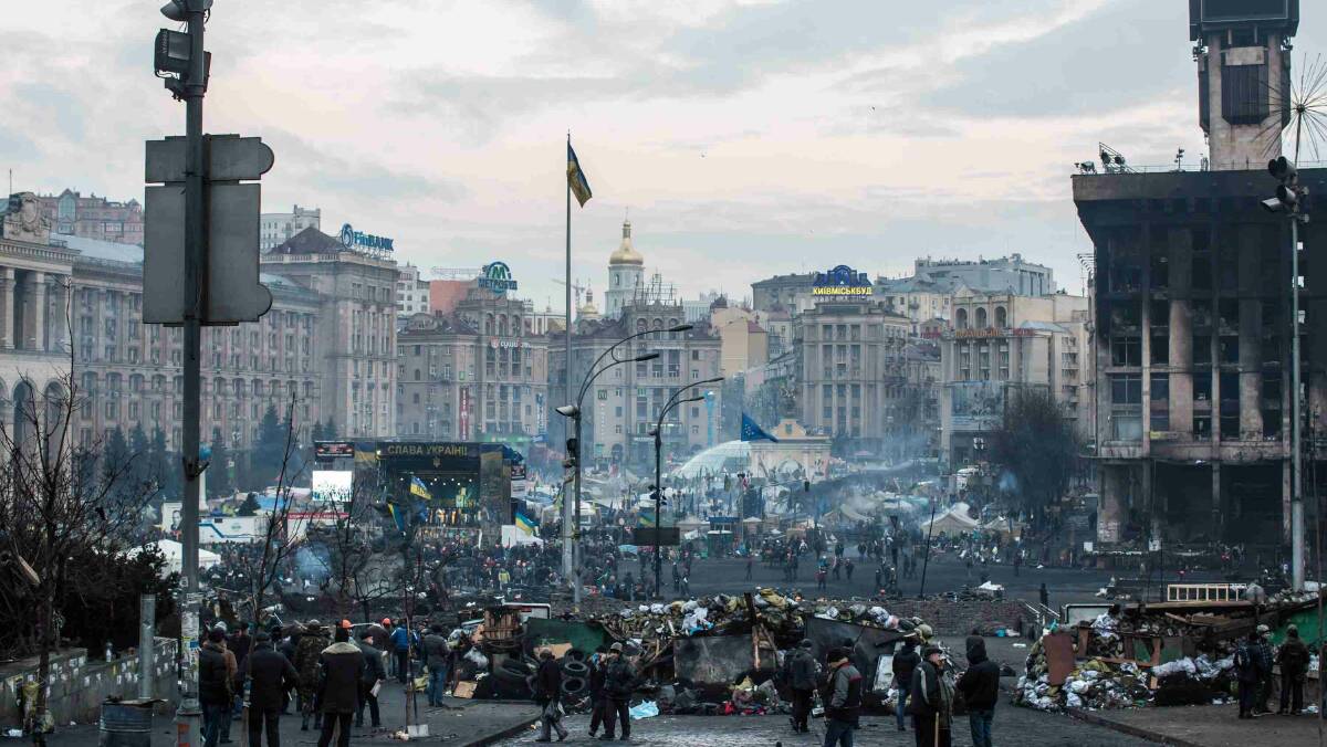 Anti-government protesters stand around in Independence Square in Kiev. Picture: Getty Images