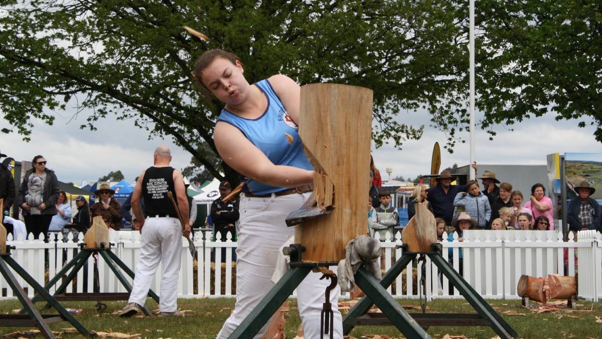 BACKHOUSE BEATS THE BLOCK: Lucy Backhouse wins the women’s underhand handicap at Murrumbateman Field Days' woodchopping competition. Picture: Hannah Sparks