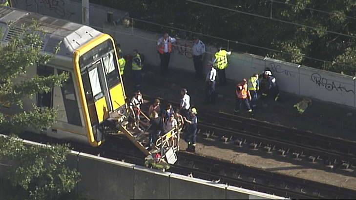 Passengers evacuate the derailed train. Photo: Seven News