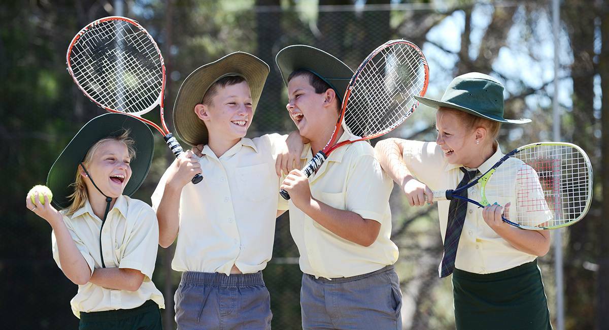  Bendemeer Public School student Teanny Bridges, from Year 4, and Riley Reid, Zac McNee and Tarni Thrift from Year 6, reckon school is something of a racket. Pic: Barry Smith, Northern Daily Leader.