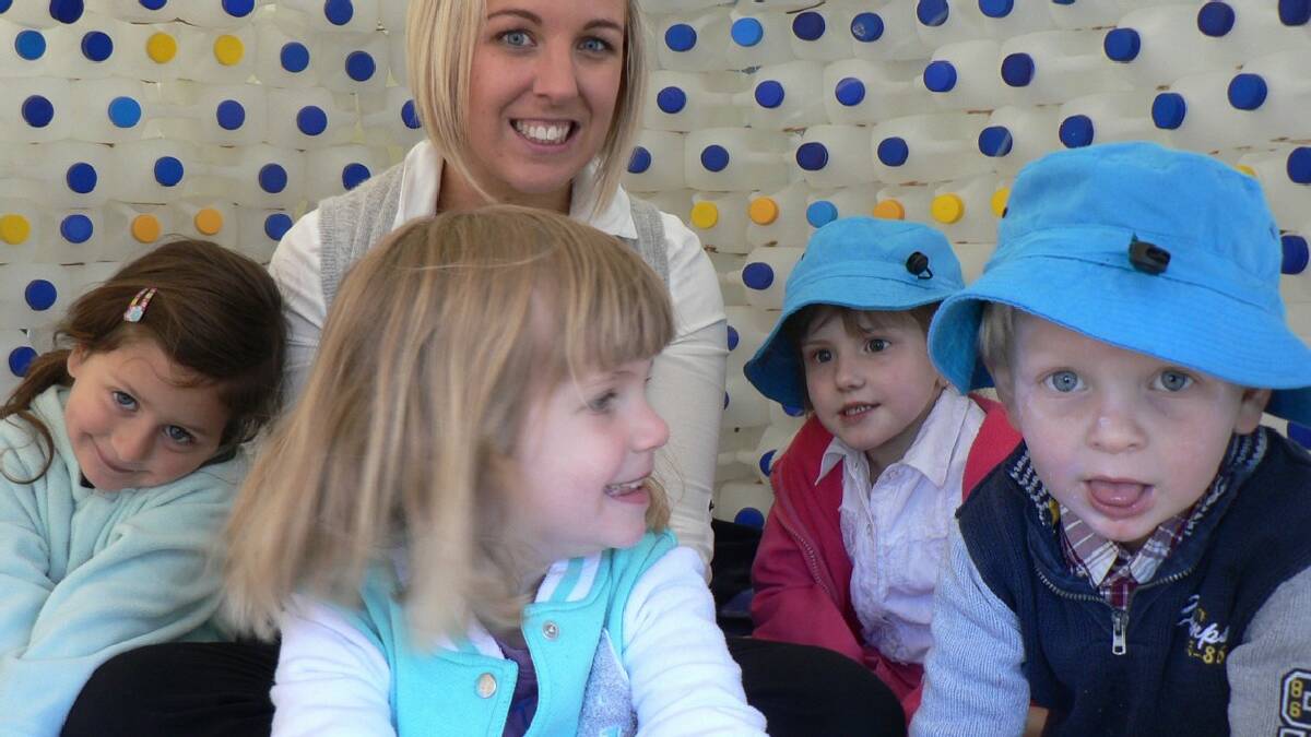 BOMBALA: The Bombala Preschool staged a Grand Opening for its milk bottle igloo this week, with Director, Simone   Peadon enjoying the day from inside the 600 bottle structure with Savanah Papalia, Bonnie Morgan, Nikahli   Stone and Oliver Bruce.