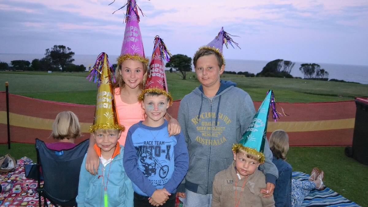 NAROOMA: Wearing their New Year hats   and waiting for the New Year’s Eve   fireworks at the Narooma Golf Club   are the McDonald kids from Narooma –   Hunter, Shaylee, Cohen, Mitchell and   Tommy.