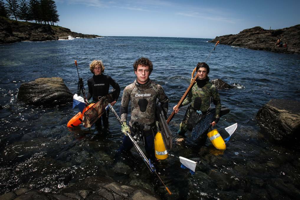 KIAMA: South Coast Sea Snipers members Mitchell Bourke, president Max Gordon-Hall and Jack Loveday have urged spear fishers and skippers to be safe this summer. Picture: DYLAN ROBINSON