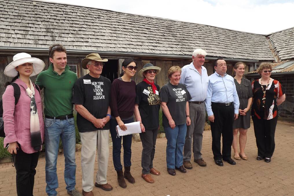 Hugh Kater, Henry Sellers, Jayne Sellers, Robin Guthrie, Mayor Bob Stewart and Council GM Ngaire McCrindle with the delegation at the Early Settlers Hut in Delegate. 