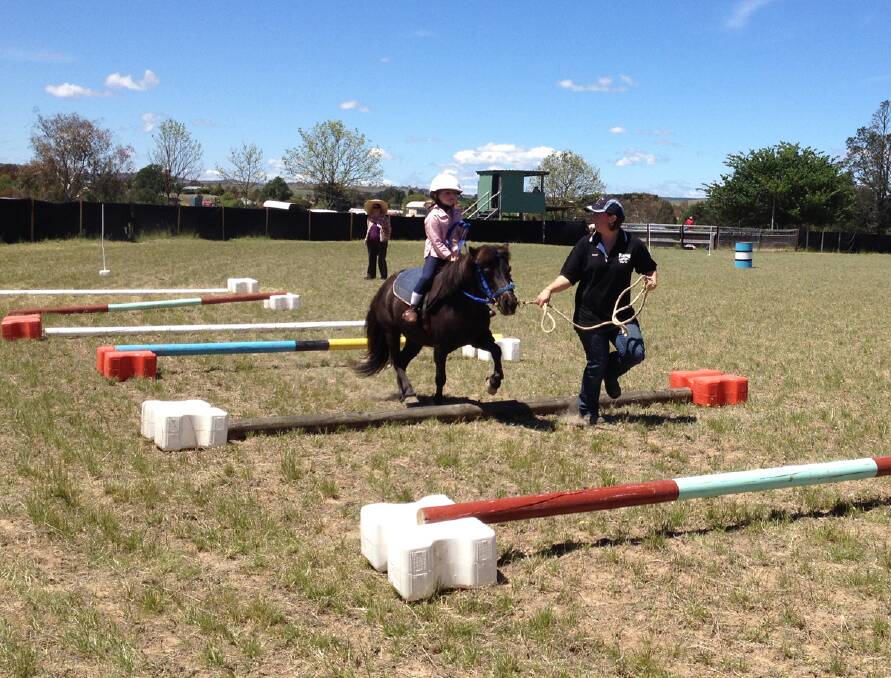 Gabby Kidd was led over some jumps by Sinead Cameron during the December 1 activities. 